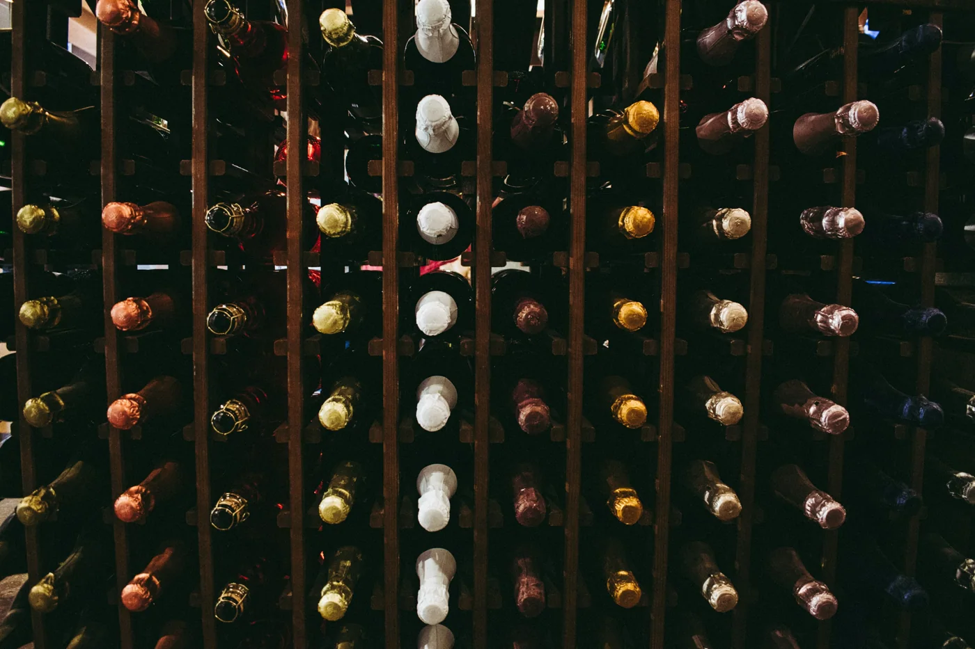 Bottles resting on racks in the cellar